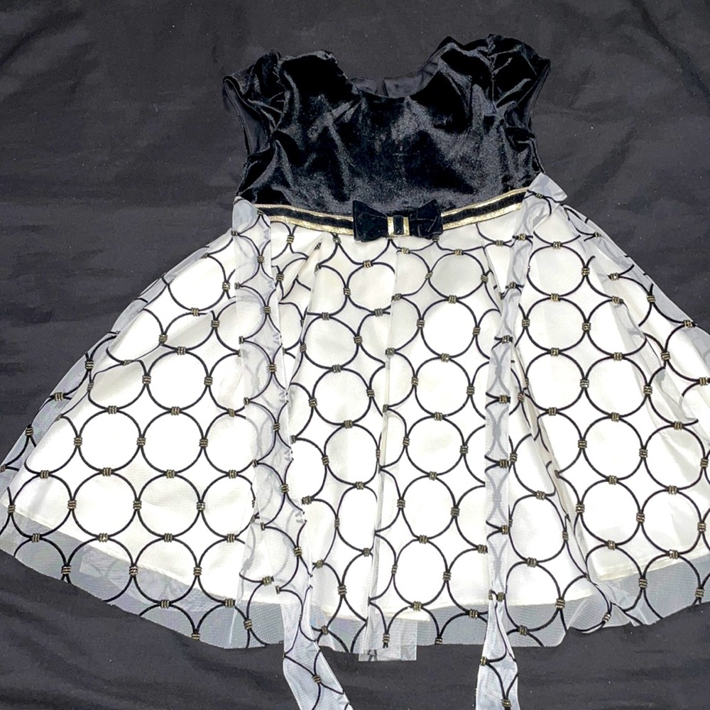 Black and gold dress, size 4T by Jona Michelle.